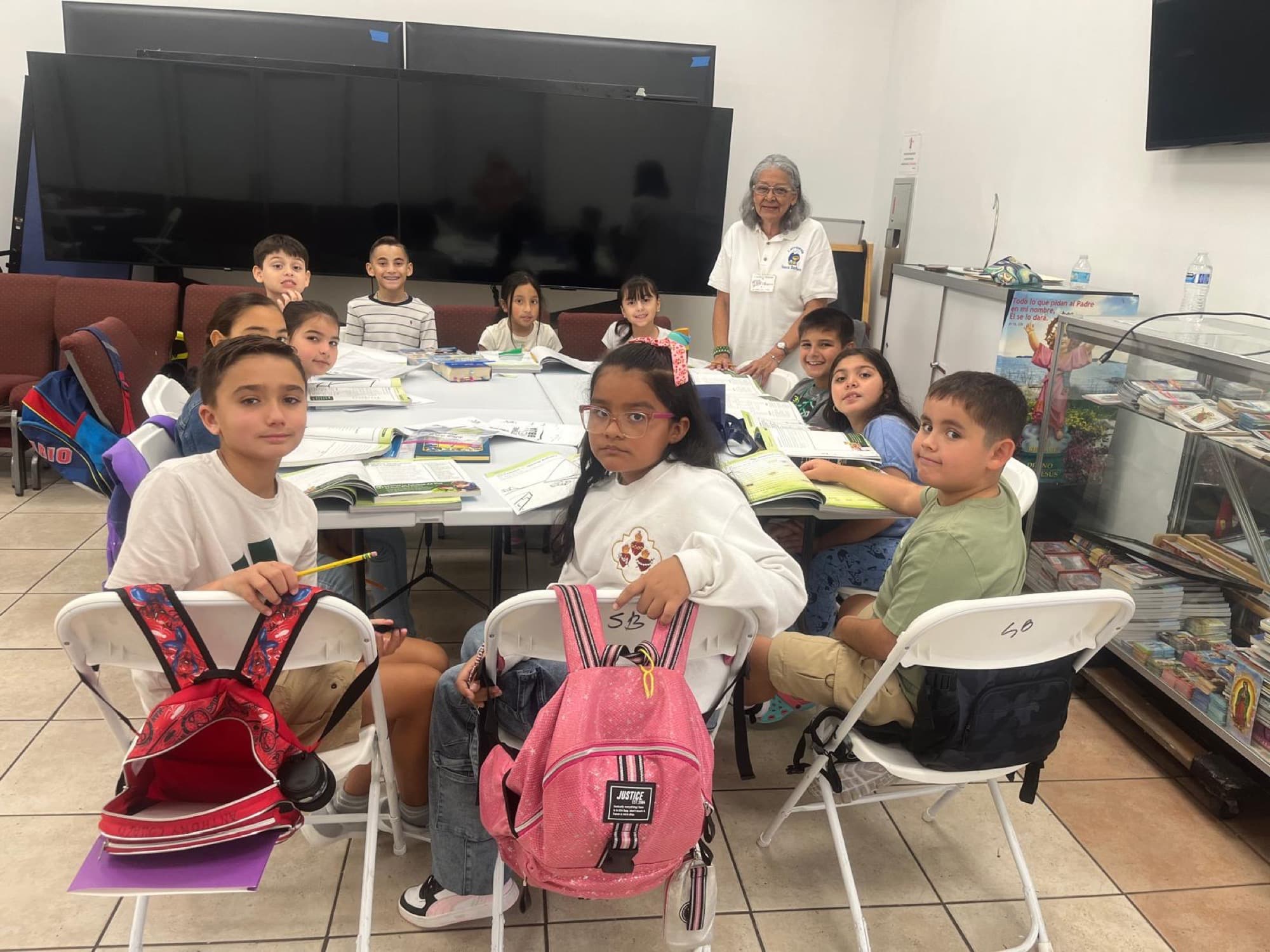 Children in CCD class studying the faith