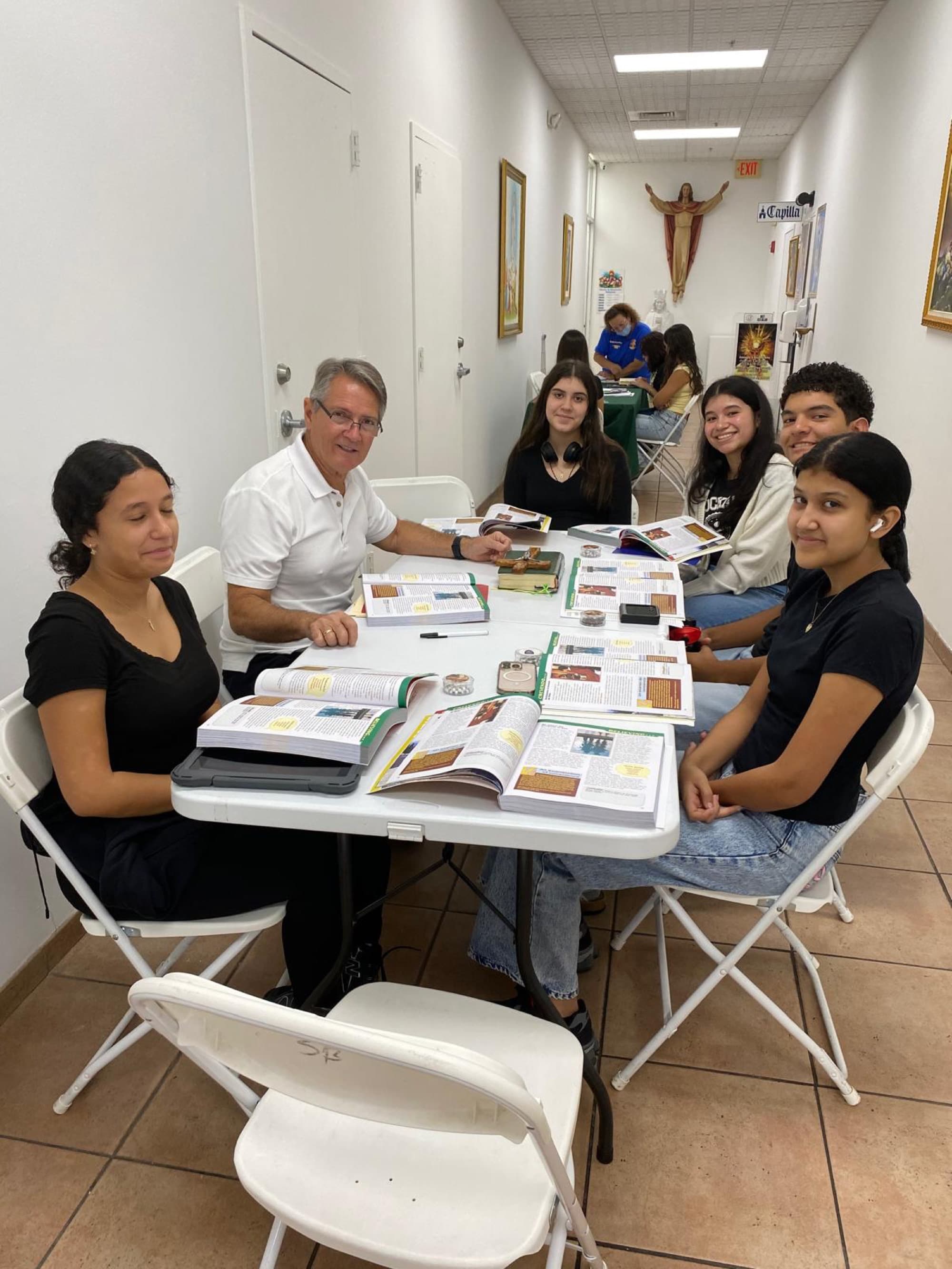 Young adults studying Scripture